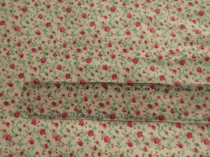 1.65m mini rose print on cream background 100% cotton 112cm wide.