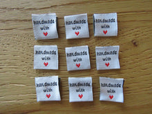 Load image into Gallery viewer, 9 White Handmade with red heart 2 x 2cm satin labels.