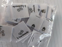 Load image into Gallery viewer, 50 Bow Handmade Labels with heart (love) on other side 20 x 20mm