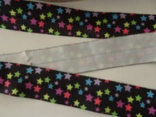 Load image into Gallery viewer, 10m Coloured Stars Wider 25mm Black FOE FoldOver Elastic