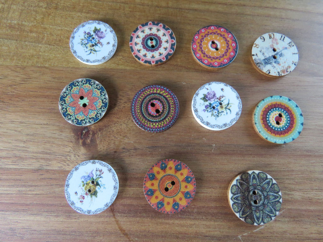 11 Mixed St of 25mm buttons as shown in photos -set of 11
