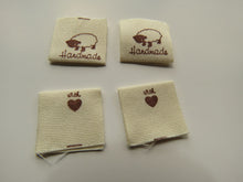 Load image into Gallery viewer, 50 Handmade with heart and Sheep Cotton Flag Labels 2 x 2cm folded