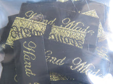 Load image into Gallery viewer, 100 Hand Made in Cursive Font Black Woven labels. 40x 15mm