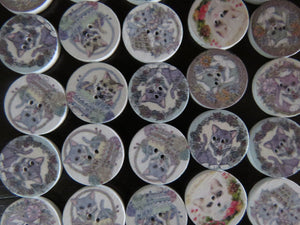 11 Cat in a basket or amongst flowers 20mm buttons white back 2 holes