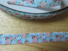 Load image into Gallery viewer, 1m Peach and Pink Roses on Blue fold over elastic 15mm wide foldover FOE