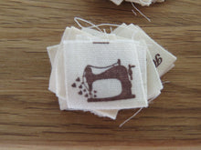 Load image into Gallery viewer, 10 Sewing Machine and Handmade with Heart on reverse cotton flag labels 2 x 2cm