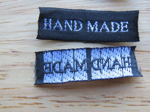 25 30 x 10mm Hand Made in White Font on Black Woven Labels
