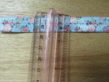 Load image into Gallery viewer, 1m Peach and Pink Roses on Blue fold over elastic 15mm wide foldover FOE