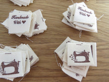 Load image into Gallery viewer, 10 Sewing Machine and Handmade with Heart on reverse cotton flag labels 2 x 2cm
