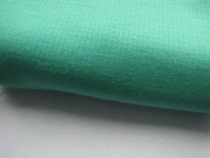 1m Cleveland Green 75% merino 25% polyester textured jersey knit 230g