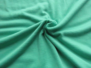 1m Cleveland Green 75% merino 25% polyester textured jersey knit 230g