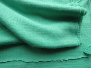 1m Cleveland Green 75% merino 25% polyester textured jersey knit 230g