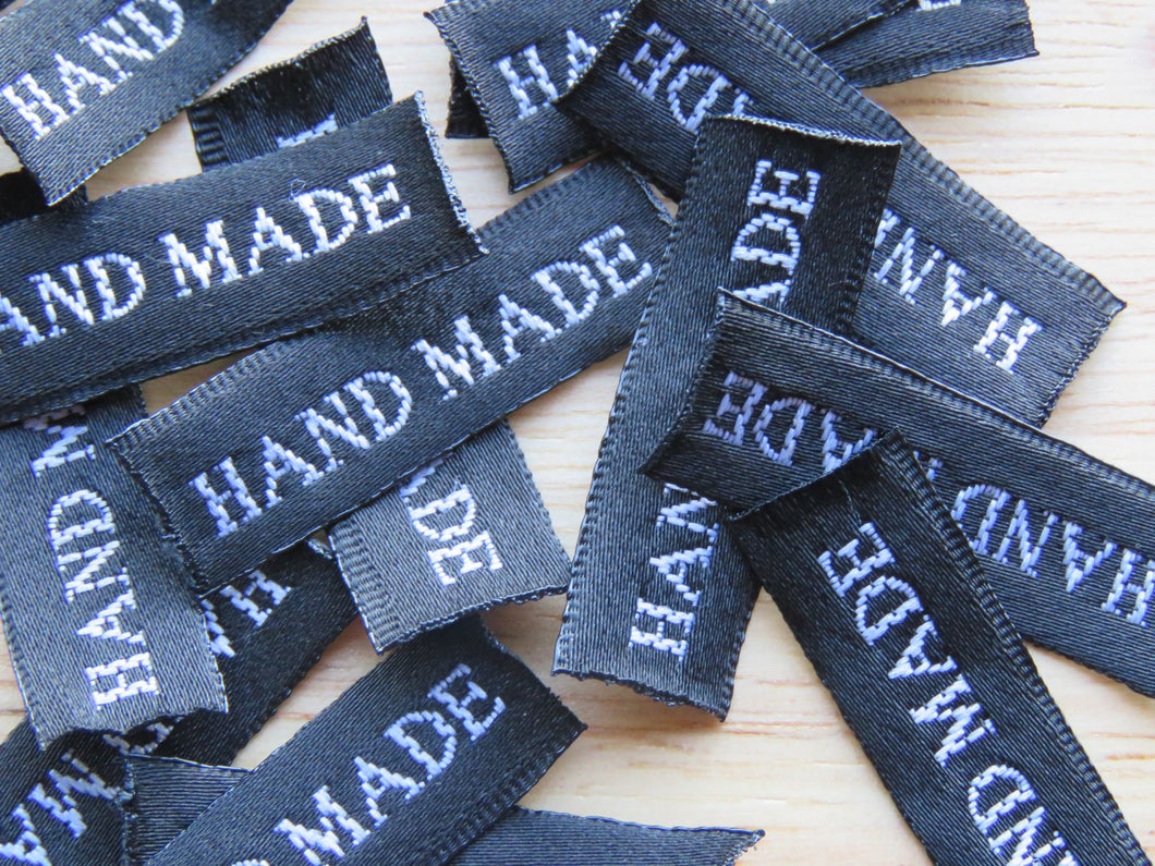 25 30 x 10mm Hand Made in White Font on Black Woven Labels