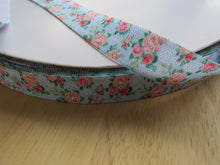 Load image into Gallery viewer, 1m Peach and Pink Roses on Blue fold over elastic 15mm wide foldover FOE