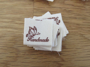 50 Butterfly Hand made  with heart (love) cotton flag labels. 2 x 2cm