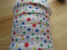 Load image into Gallery viewer, 1.7m Stars Blue Red Yellow Green on White FoldOver Elastic FOE Fold over elastic
