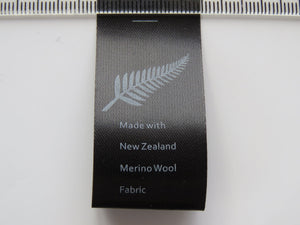 5 Fern Symbol Black Satin washing instructions/ made with NZ Merino wool labels