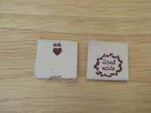 Load image into Gallery viewer, 25 Hand made with a twig leaf border cotton flag labels. 2 x 2cm