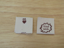 Load image into Gallery viewer, 100 Hand made with a twig leaf border cotton flag labels. 2 x 2cm