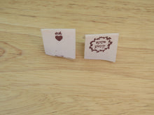 Load image into Gallery viewer, 100 Hand made with a twig leaf border cotton flag labels. 2 x 2cm