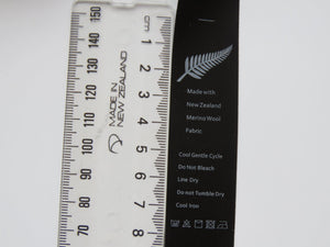10 Fern Symbol Black Satin washing instructions/ made with NZ Merino wool labels