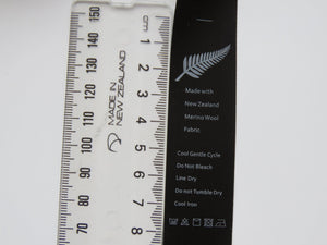 5 Fern Symbol Black Satin washing instructions/ made with NZ Merino wool labels