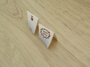 100 Hand made with a twig leaf border cotton flag labels. 2 x 2cm