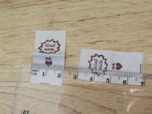 Load image into Gallery viewer, 25 Hand made with a twig leaf border cotton flag labels. 2 x 2cm