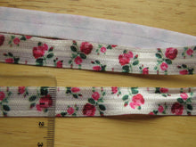 Load image into Gallery viewer, 1m Pink Roses on White 15mm fold over elastic FOE foldover elastic