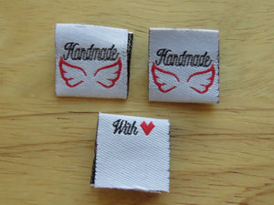 6 White Handmade 2 wings and with heart symbol for love on back satin flag label