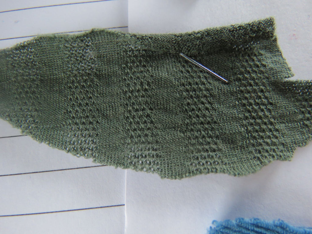 1m Huntsmen Olive green textured jersey knit 60% merino 40% polyester 170g