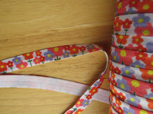 Load image into Gallery viewer, 1m Purple Orange Retro Flower Print 15mm wide fold over elastic