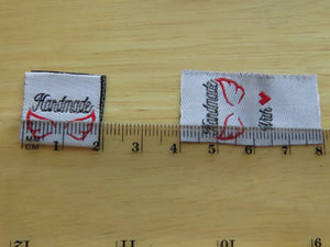 50 White Handmade 2 wings and with heart symbol for love on back satin flag label