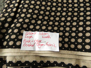 1.25m x 112cm Black and Beige Circle print- Rayon?