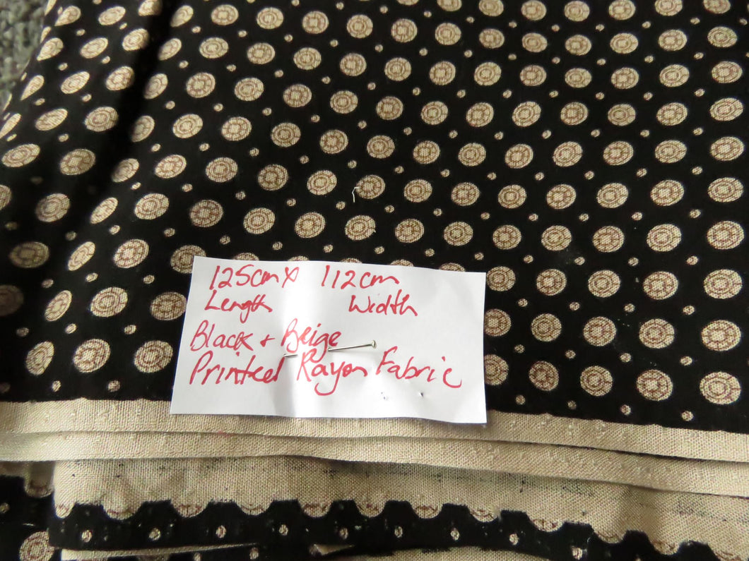 1.25m x 112cm Black and Beige Circle printed Rayon