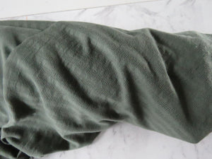 1m Huntsmen Olive green textured jersey knit 60% merino 40% polyester 170g
