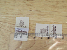 Load image into Gallery viewer, 25 Cat behind ball of wool Handmade with Love cotton flag labels. 2 x 2cm