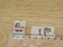 Load image into Gallery viewer, 50 Butterfly Hand made  with heart (love) cotton flag labels. 2 x 2cm