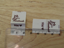Load image into Gallery viewer, 50 Butterfly Hand made  with heart (love) cotton flag labels. 2 x 2cm
