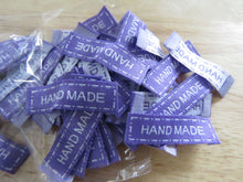 Load image into Gallery viewer, 50 Purple Hand Made Labels with white border 40x 10mm