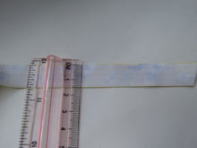 Load image into Gallery viewer, 2.8m White Daisy on black 15mm wide fold over elastic
