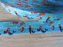 Load image into Gallery viewer, 4m Mermaids on Blue fold over elastic FOE Foldover elastic 15mm