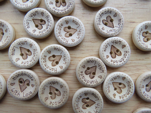 10 25mm Large Heart in Centre with  Handmade with love on circumference buttons