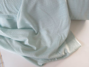 1m Frosty Mint Green 57% merino 34% tencil 15% nylon 150g eyelet  fabric
