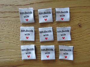 25 White Handmade with red heart 2 x 2cm satin flag shape labels