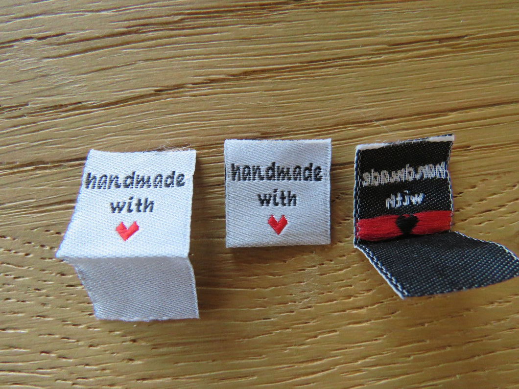 25 White Handmade with red heart 2 x 2cm satin flag shape labels