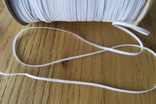 Load image into Gallery viewer, 1m White elastic  Width 3mm- use for facemasks, crafts, sewing.